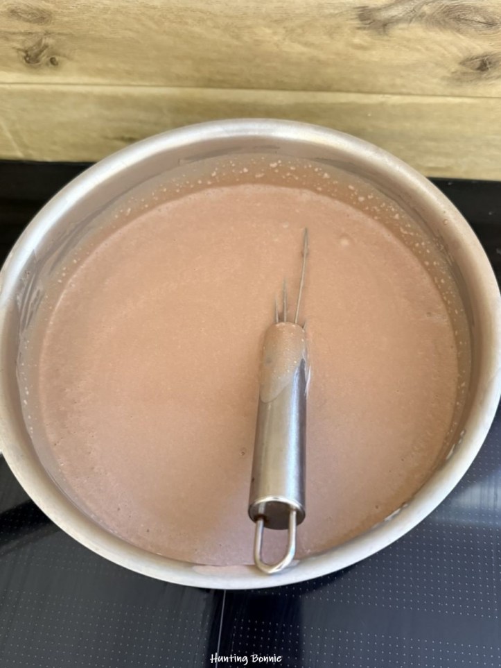 Fin de cuisson de la panna cotta au cacao